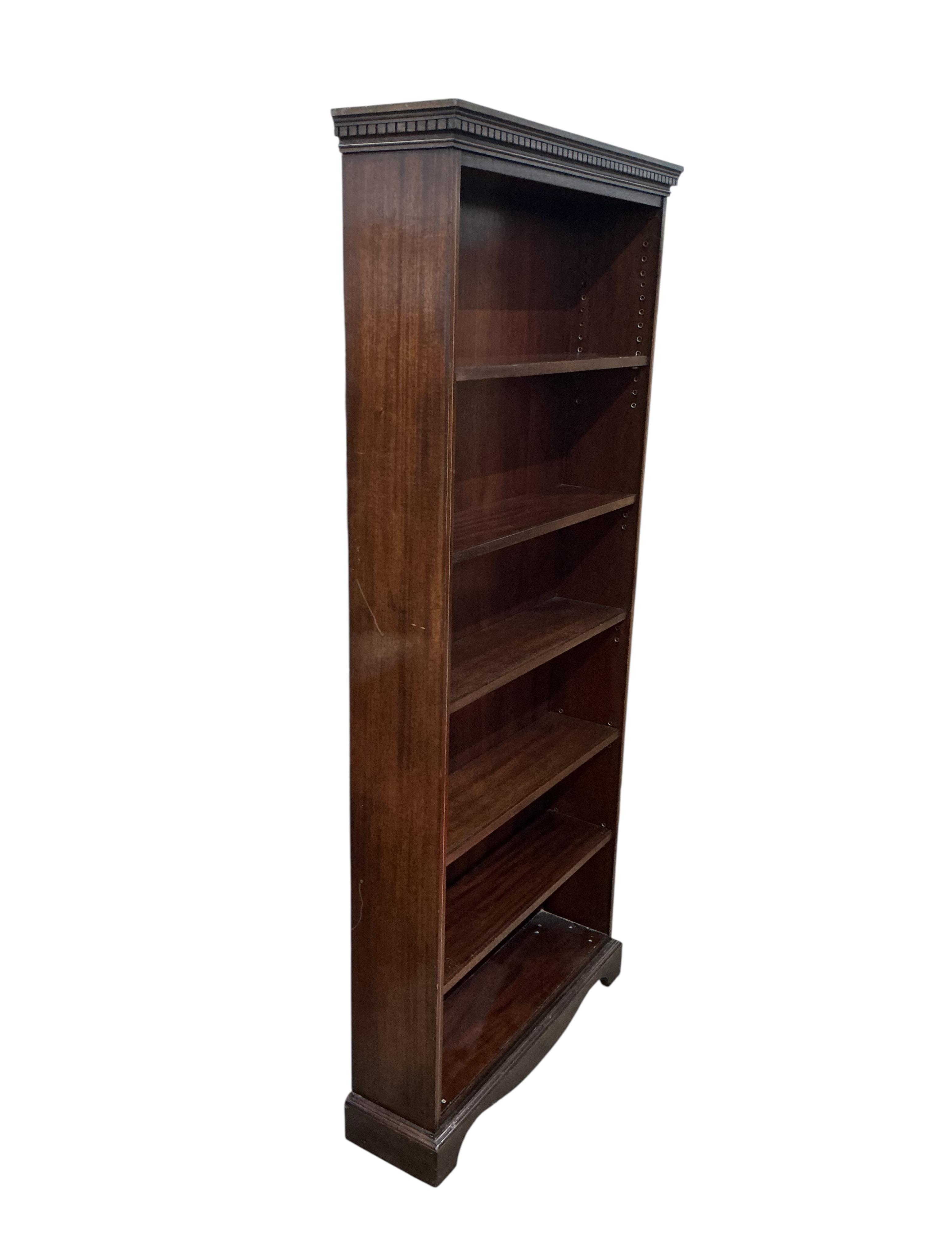 A reproduction Edwardian style mahogany open bookcase, width 79cm, depth 22cm, height 182cm